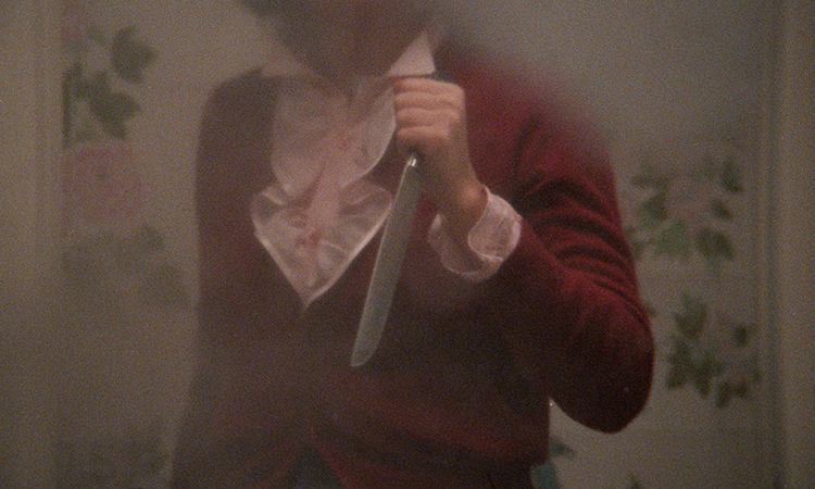 Still from BLADE IN THE DARK, A